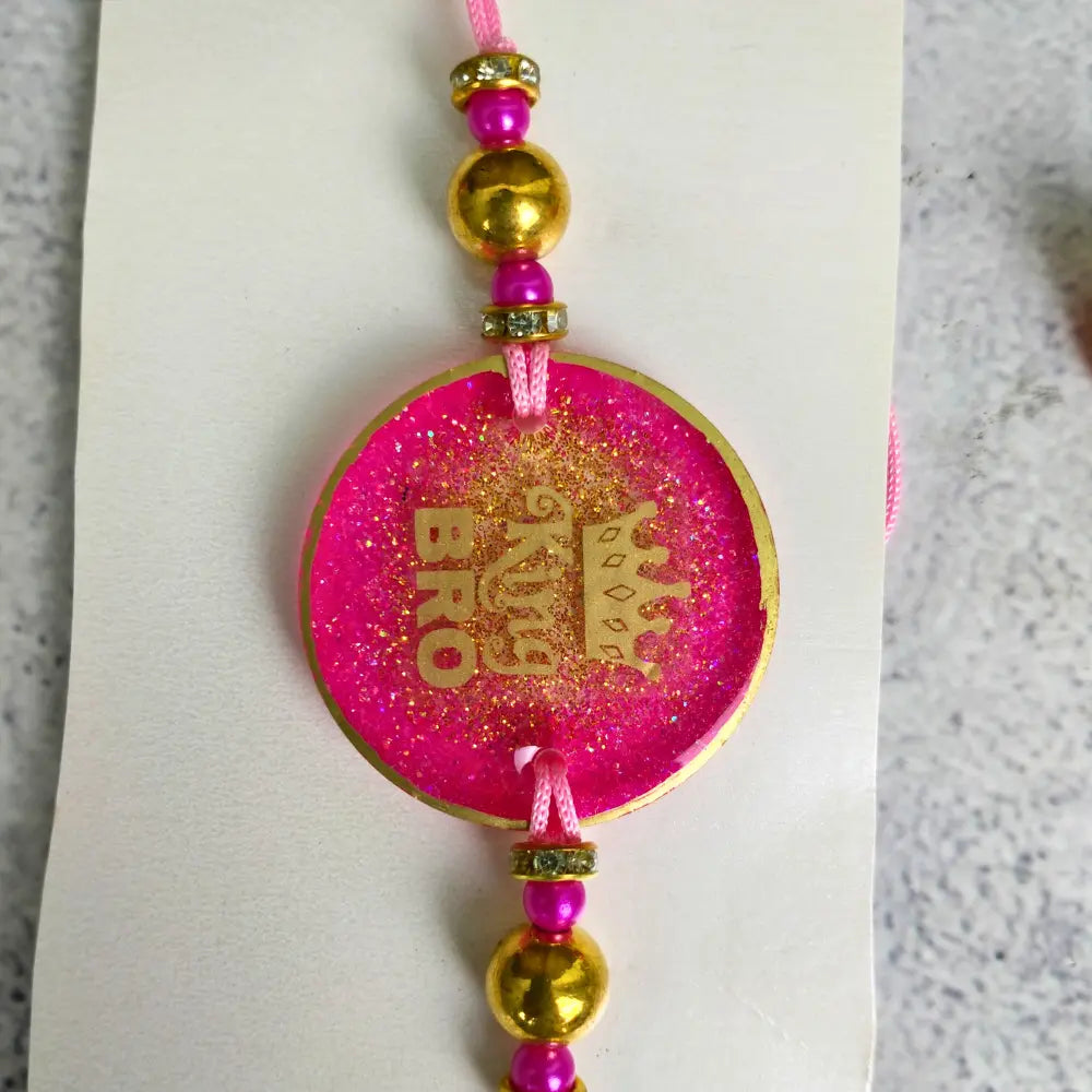 Pink Resin Couple Rakhi For Bhaiya Bhabhi (King and Queen)