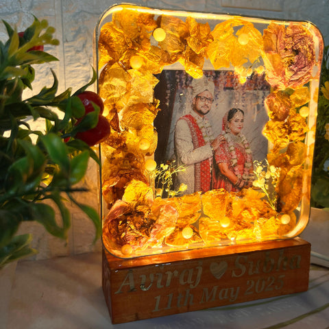 Resinn 6 inch block with Couple photo & Name date with LED stand Varmala Preservation Resinn 6 inch block with Couple photo & Name date with LED stand Varmala Preservation