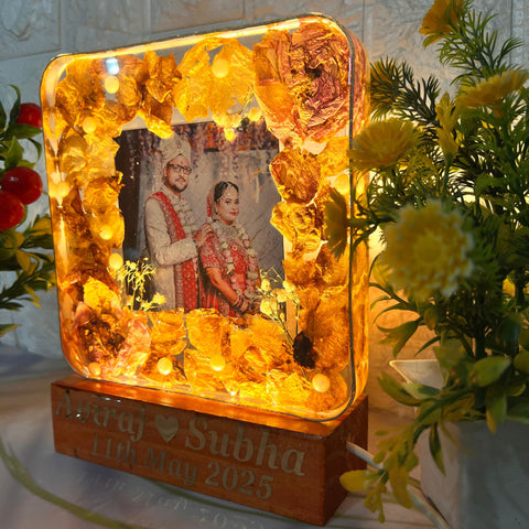 Resinn 6 inch block with Couple photo & Name date with LED stand Varmala Preservation Resinn 6 inch block with Couple photo & Name date with LED stand Varmala Preservation