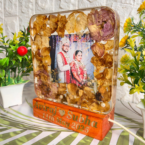 Resinn 6 inch block with Couple photo & Name date with LED stand Varmala Preservation Resinn 6 inch block with Couple photo & Name date with LED stand Varmala Preservation