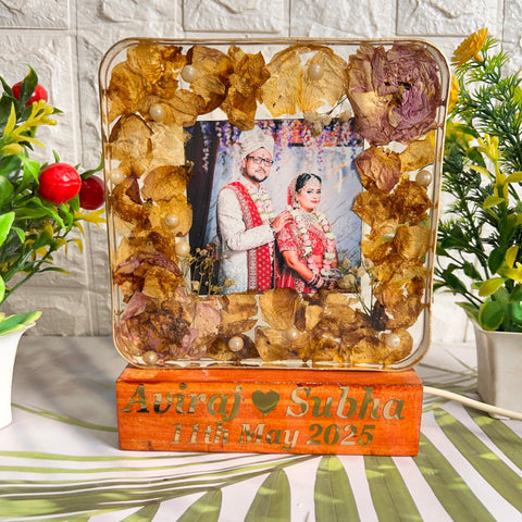 Resinn 6 inch block with Couple photo & Name date with LED stand Varmala Preservation Resinn 6 inch block with Couple photo & Name date with LED stand Varmala Preservation
