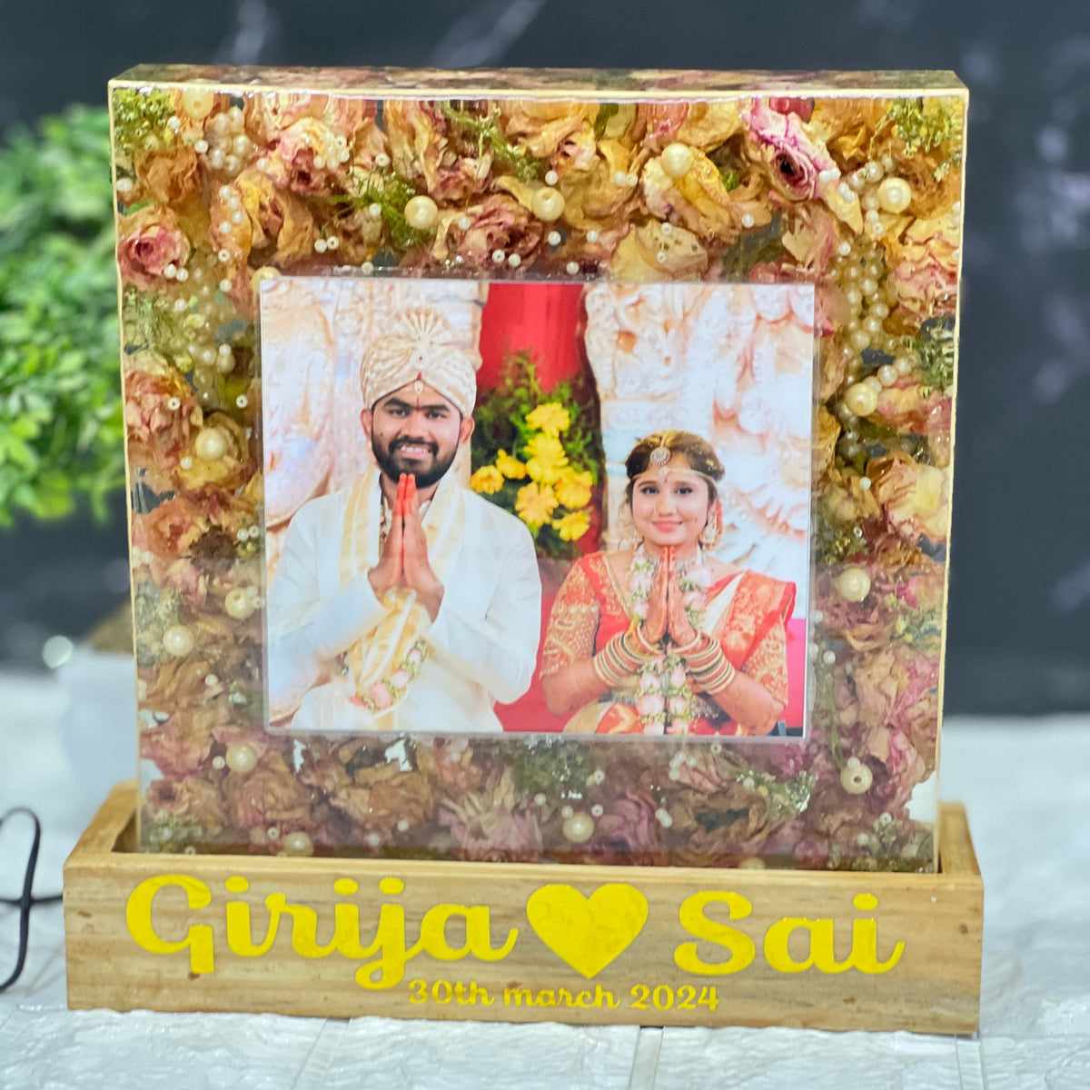 8 inch varmala resin block on wooden LED base with golden flowers, names on base