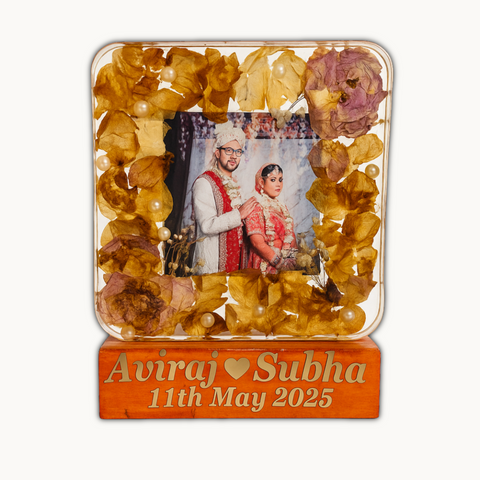 Resinn 6 inch block with Couple photo & Name date with LED stand Varmala Preservation Resinn 6 inch block with Couple photo & Name date with LED stand Varmala Preservation