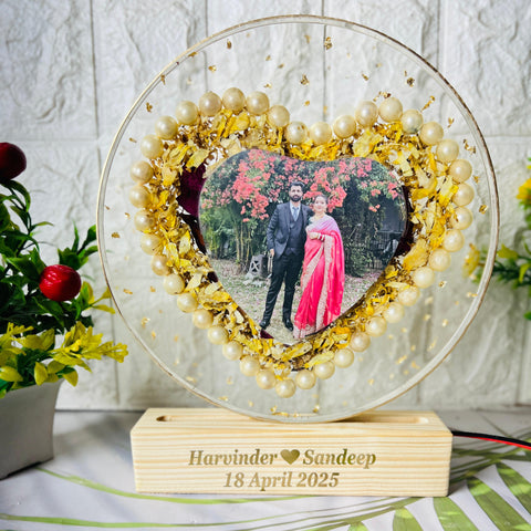 Resin 8inch round with heart shape with couple photo & pearls border with two varmala Preservation Resin 8inch round with heart shape with couple photo & pearls border with two varmala Preservation