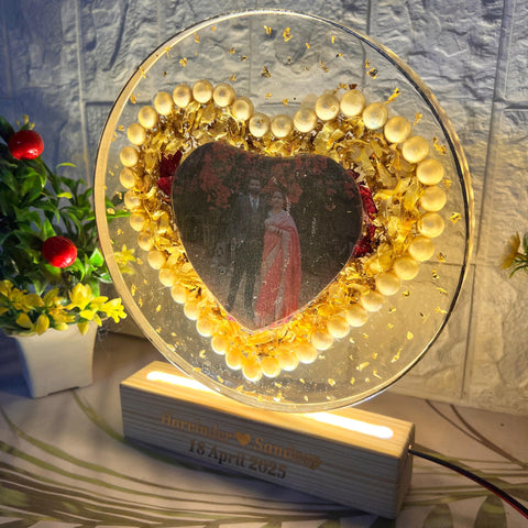 Resin 8inch round with heart shape with couple photo & pearls border with two varmala Preservation Resin 8inch round with heart shape with couple photo & pearls border with two varmala Preservation