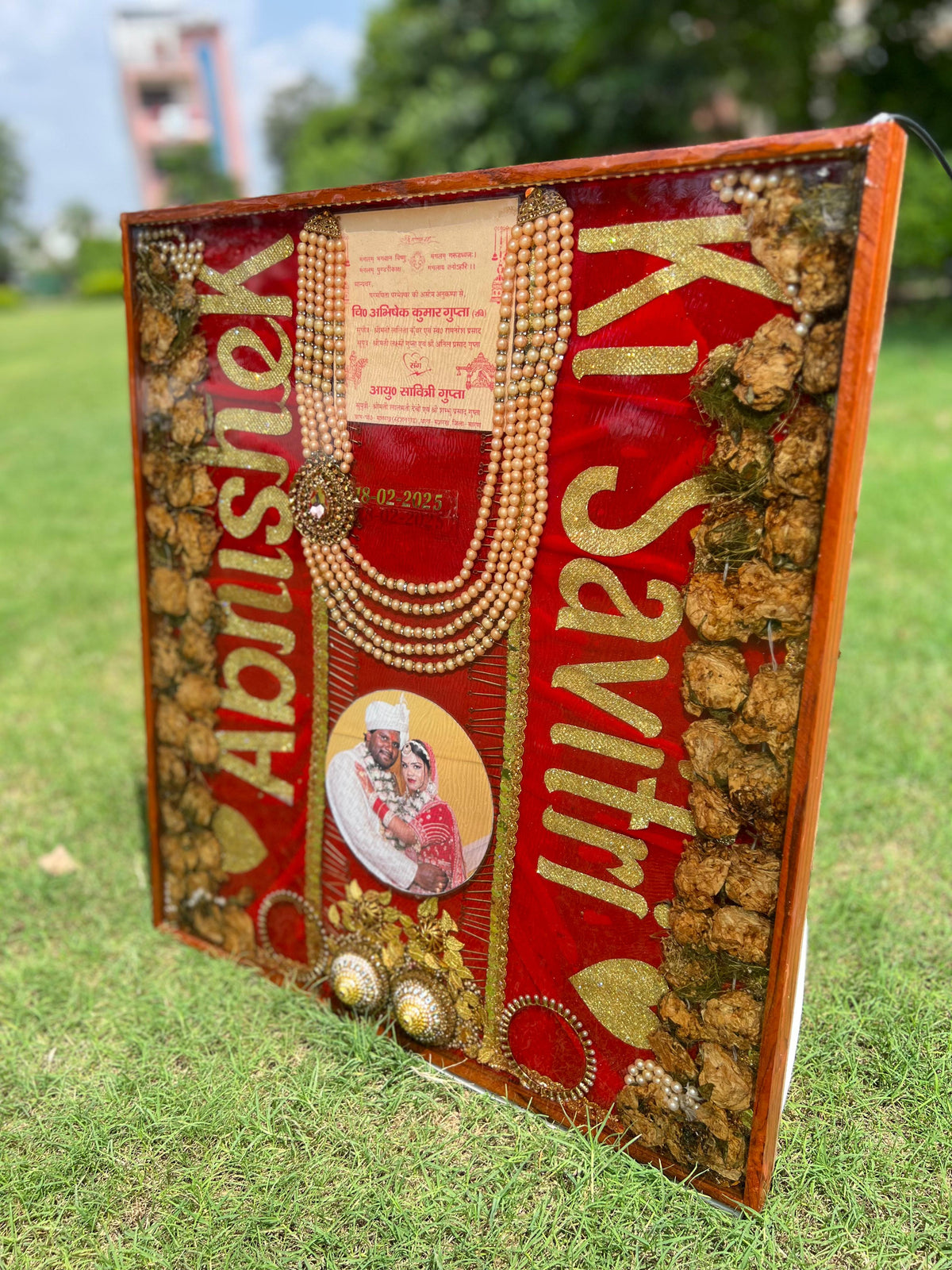 Resin 22×24 inch teakwood frame with Red dupatta . wedding card . Kantha , Kaleera , Chuda with Couple photo , Full stuff & Full Varmala Preservation