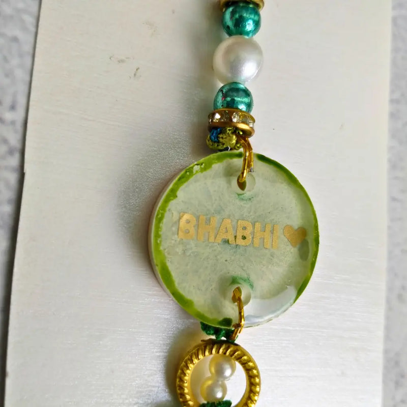 Light Green Resin Couple Rakhi For Big Bhaiya Bhabhi