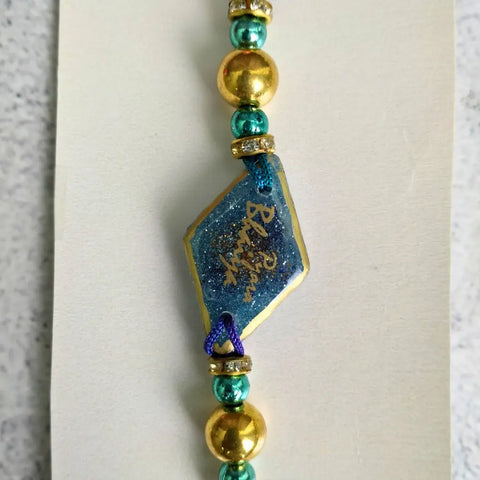 Purple & Gold Resin Couple Rakhi For Pyara Bhaiya Bhabhi (Set Of Two)
