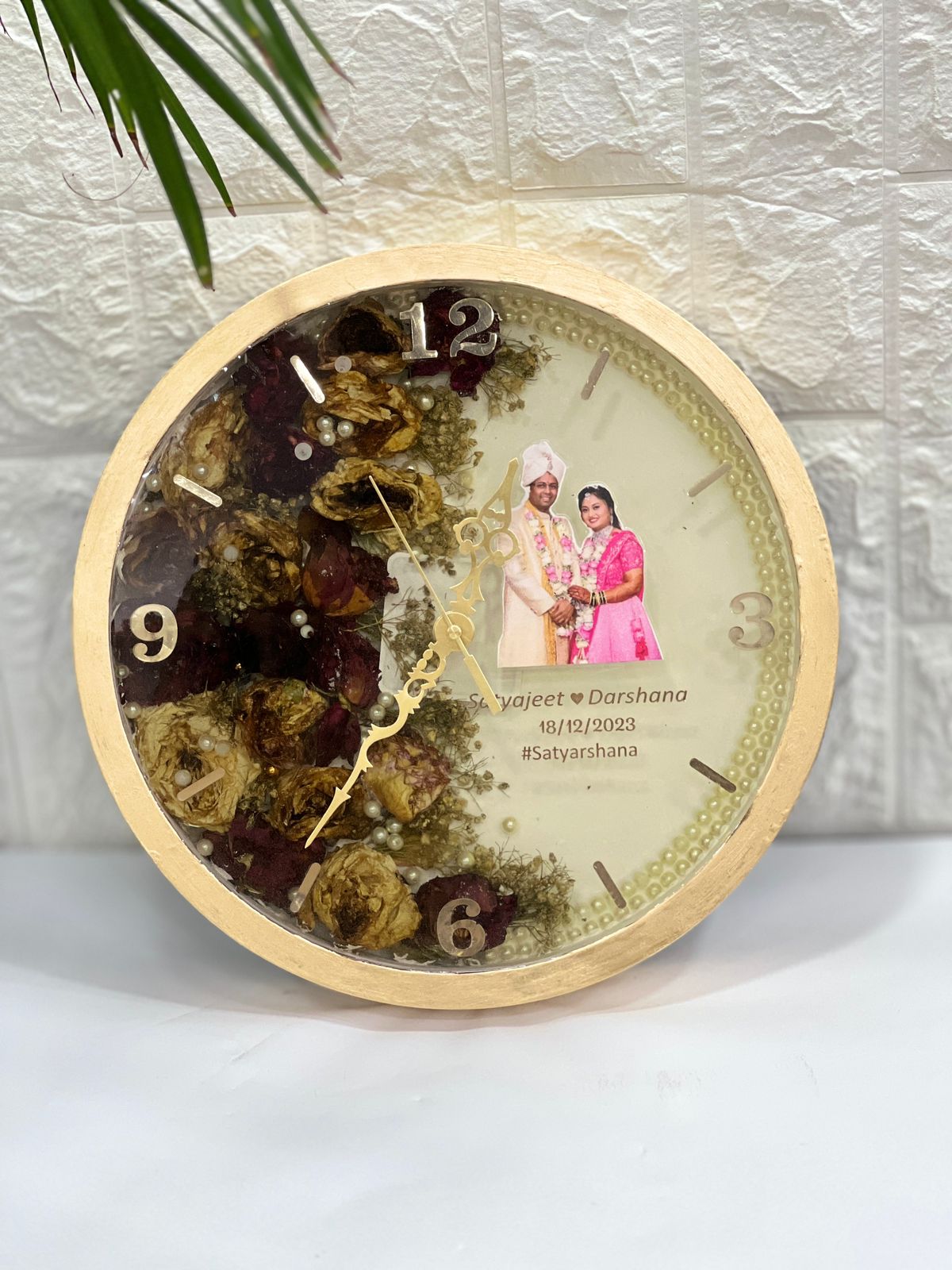 Beautiful golden varmala preservation clock