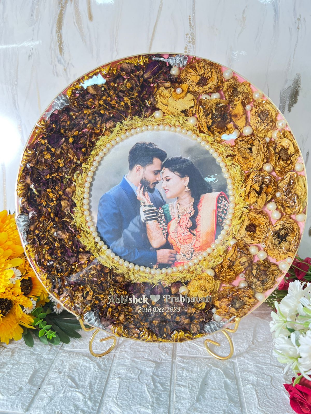 Resin 14 inch round with metal stand with yellow and rad peatles with pearls with couple photo and Name and Date Varmala Preservation