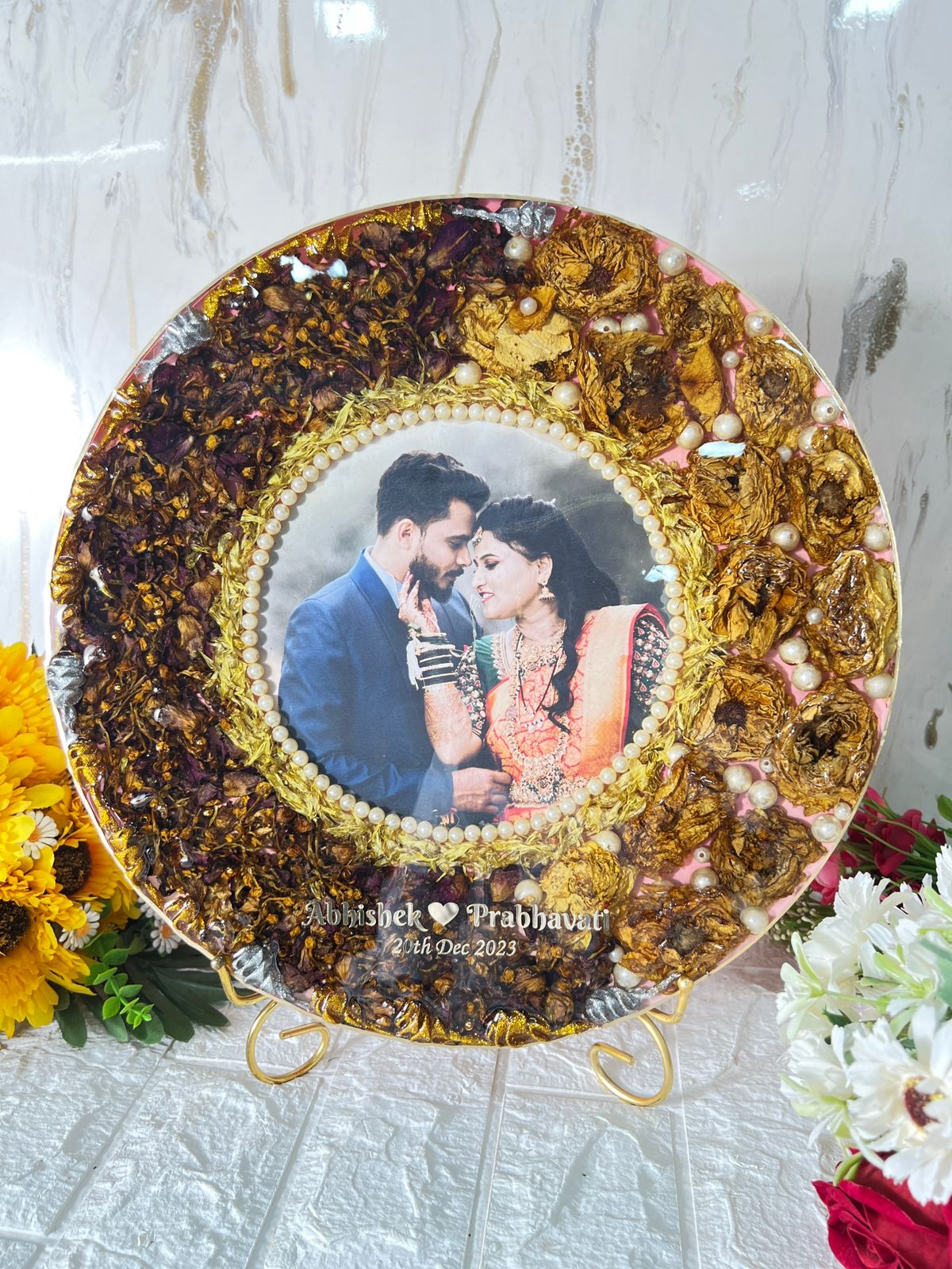 Resin 14 inch round with metal stand with yellow and rad peatles with pearls with couple photo and Name and Date Varmala Preservation