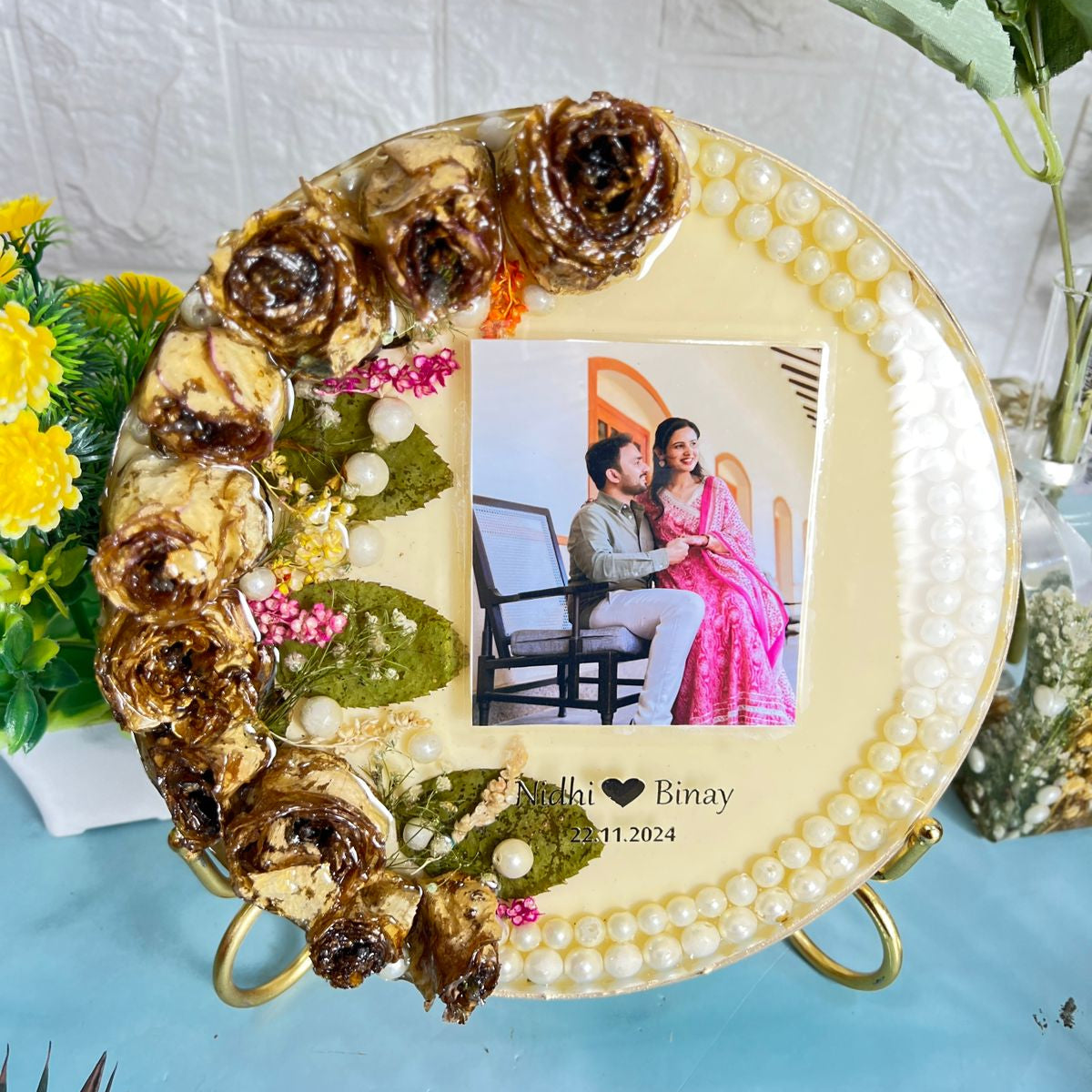8 inch round varmala preservation table frame with roses and pearls