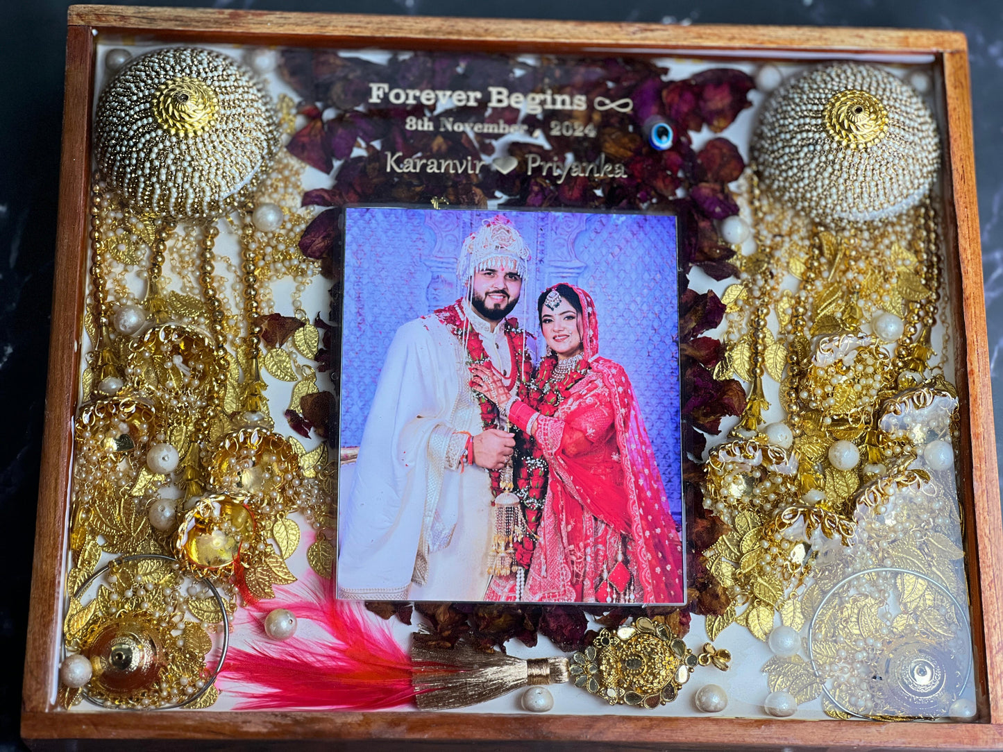 Resin 11 inch by 14 inch Wooden frame with Red petals and Couple photo and Keleera and Kalangi  and Couple Name and Date with Varmala Preservation