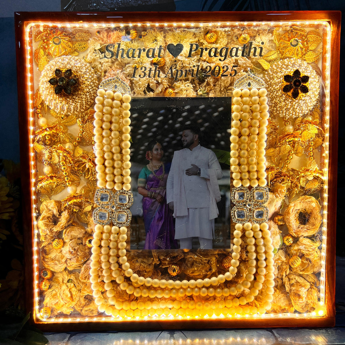 Resin 12 inch wooden frame with led light connection with kaleera ,kantha flowers ,name date and photo Varmala Presevation