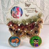 Scalloped round varmala table frame with mini photos