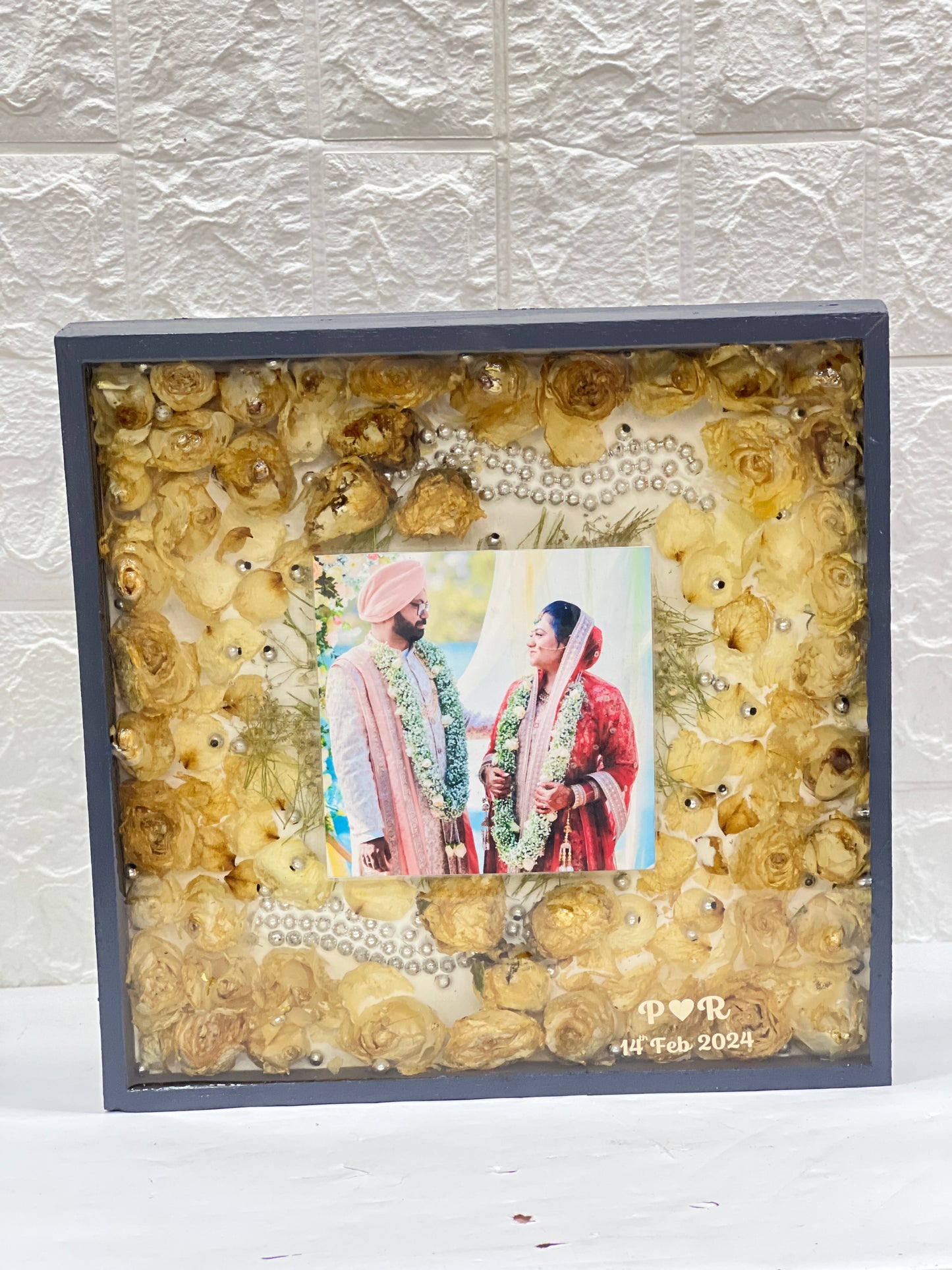 Classy gray varmala preservation wall frame with photo