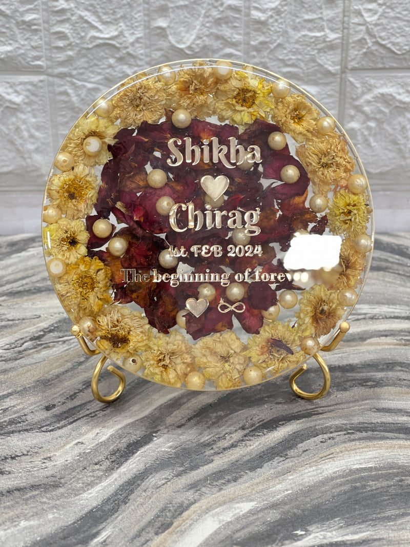 Beautiful yellow red varmala round frame preservation with names and metal stand