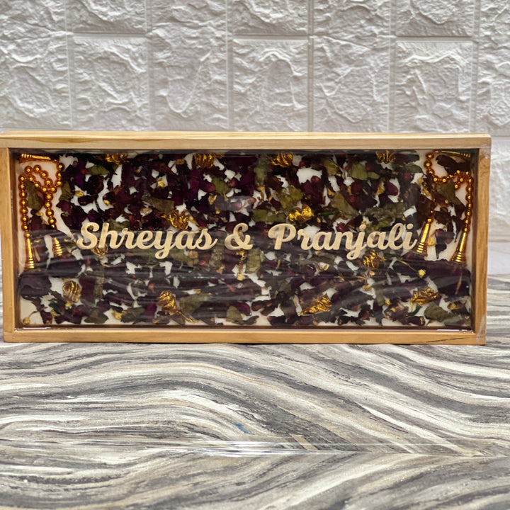 Teak wood box frame varmala nameplate with wedding petals inside and the couple's names on top