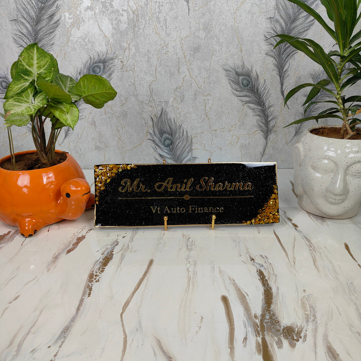 Black and gold resin desk nameplate strip, 12 by 4 inch, with name and designation