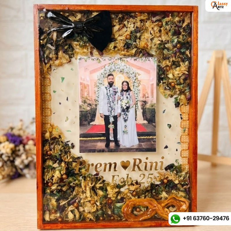 Resin 12 by 16 inch frame with Couple Photo & Head Band & tai also with Orchid Varmala Preservation