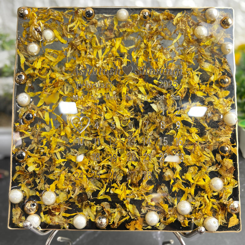 Resin 8 inch square frame with   black base petals and name date n calendar on the top with metal stand  Varmala Preservation