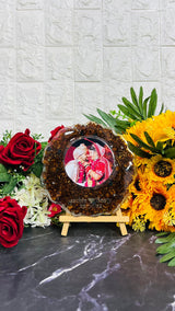 6 inch round resin block with red petals and couple photo on wooden stand