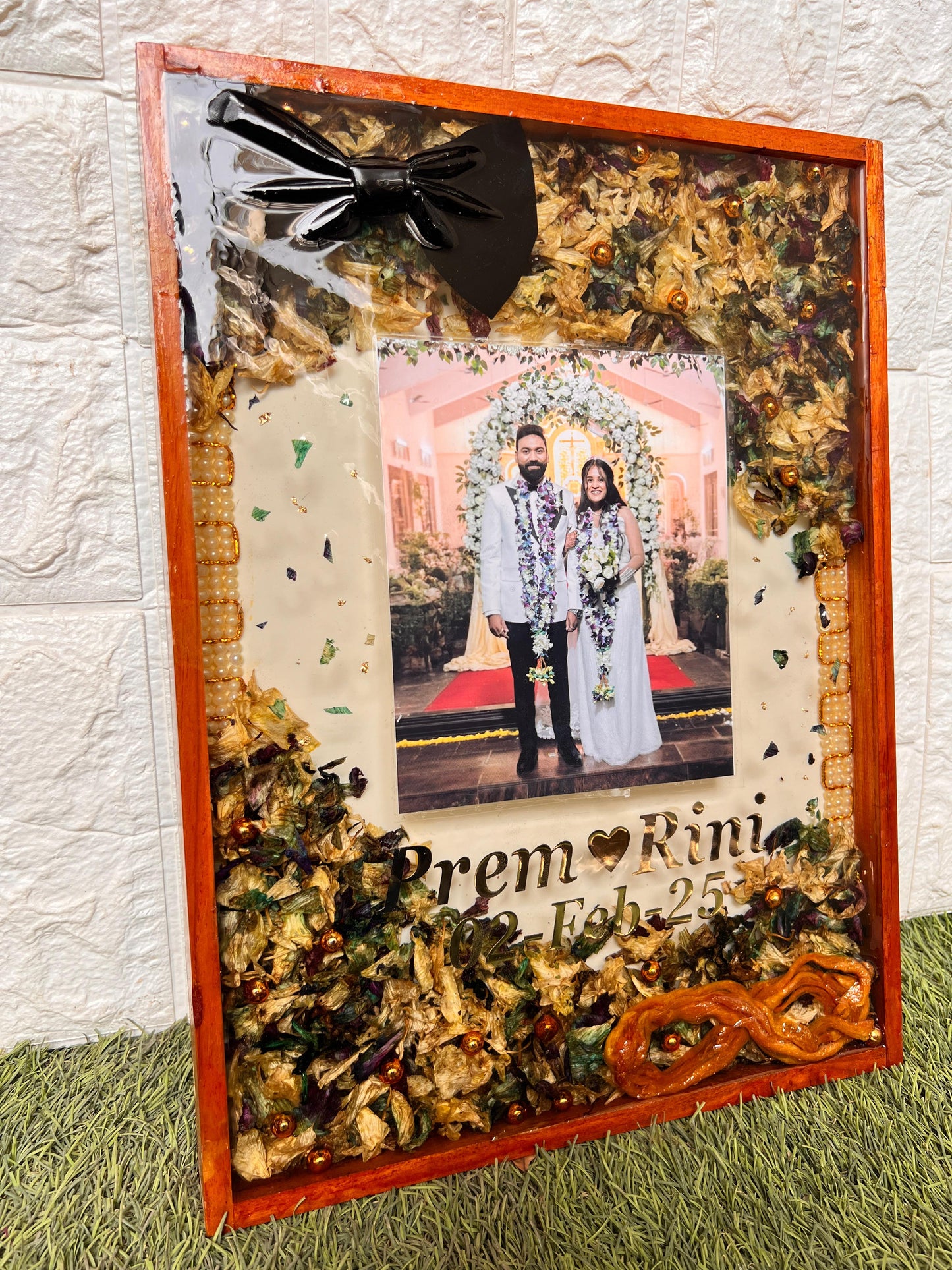 Resin 12 by 16 inch frame with Couple Photo & Head Band & tai also with Orchid Varmala Preservation