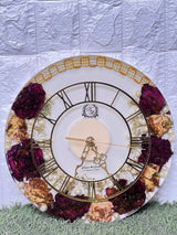 Resin 12 inch clock with In 3/4 part covered with flowers , upr part with pearl 2 lines white base in middle pink colour with logo in center Varmala Preservation