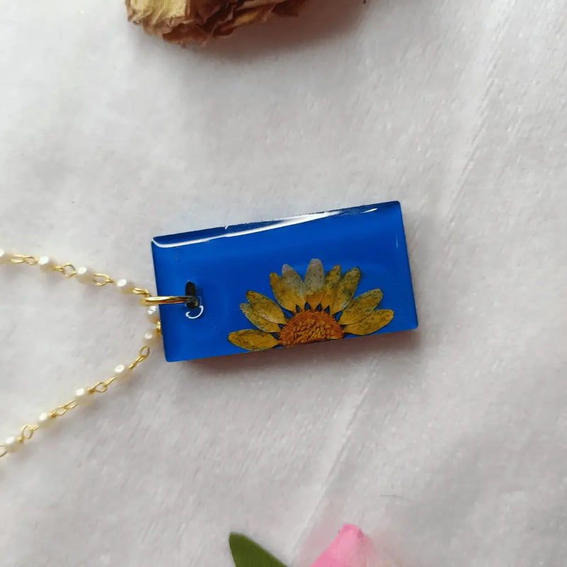 buy Handmade Resin Pendant With Half Daisy Pearl Flower online