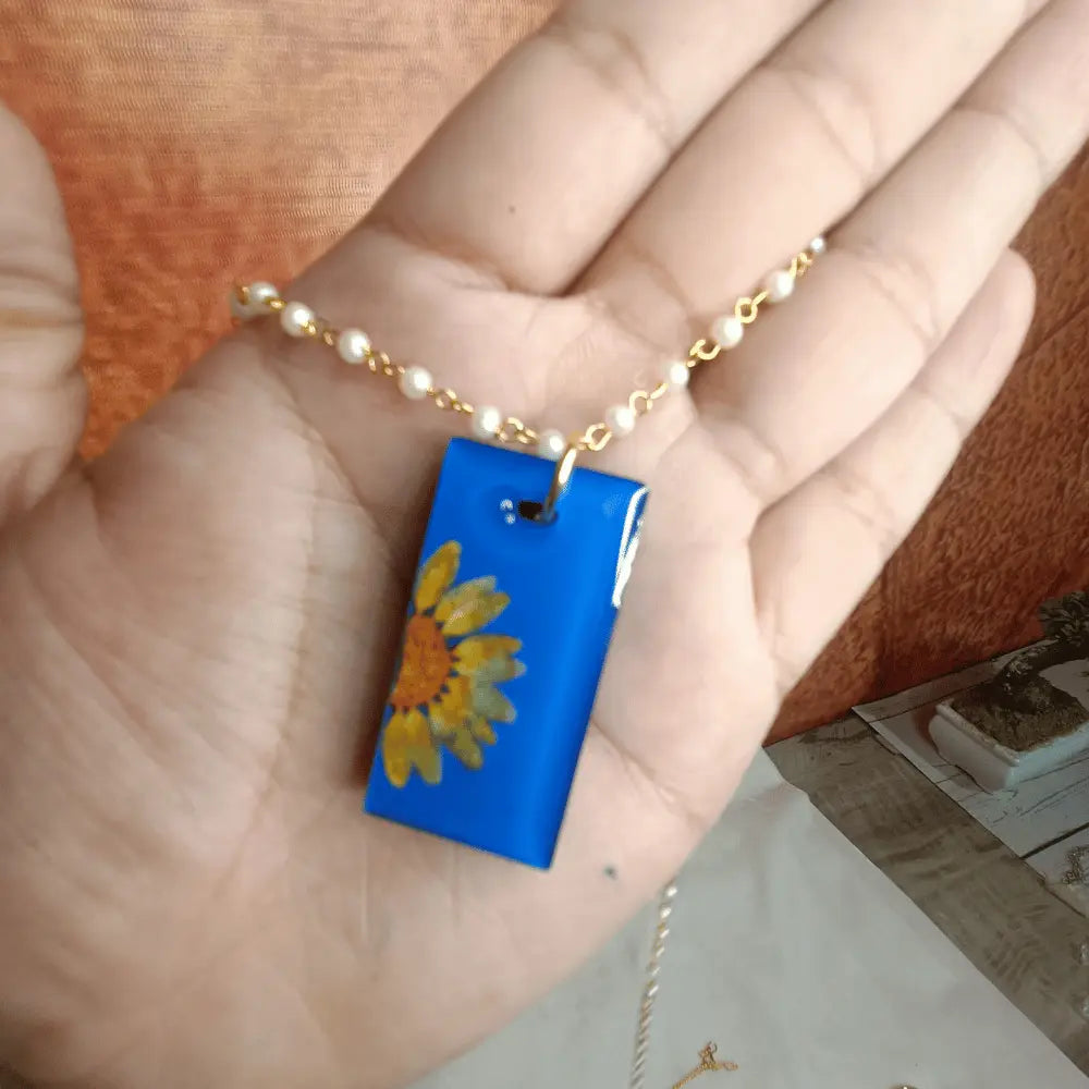 buy Handmade Resin Pendant With Half Daisy Pearl Flower