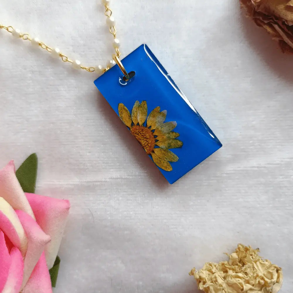 Handmade Resin Pendant With Half Daisy Pearl Flower