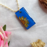 Handmade Resin Pendant With Half Daisy Pearl Flower