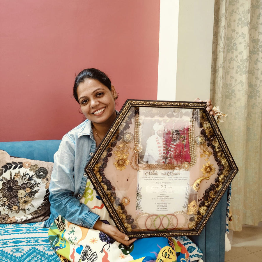 Hexagon varmala preservation frame holding a wedding card, made in our Jaipur studio