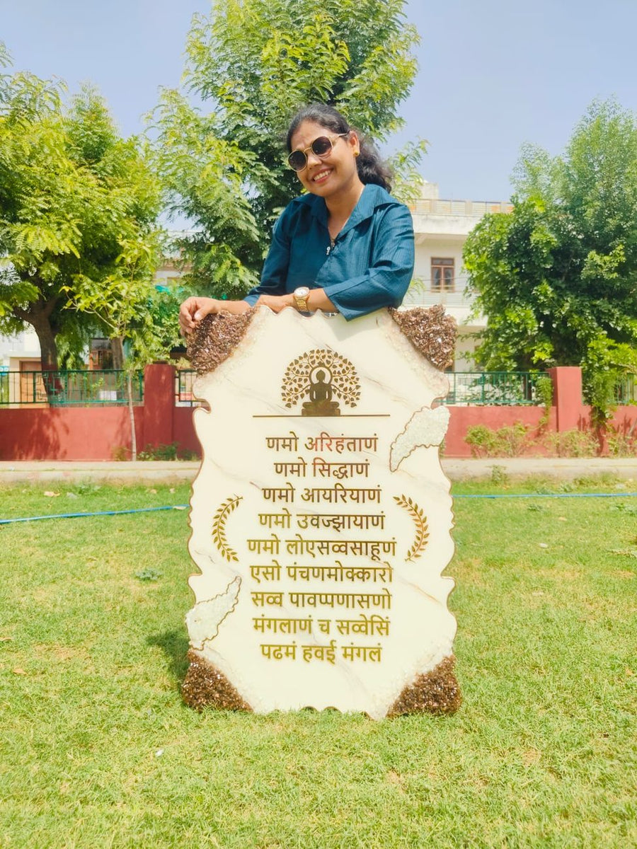 Tall Namokar mantra resin plaque on a lawn, handmade in our Jaipur studio