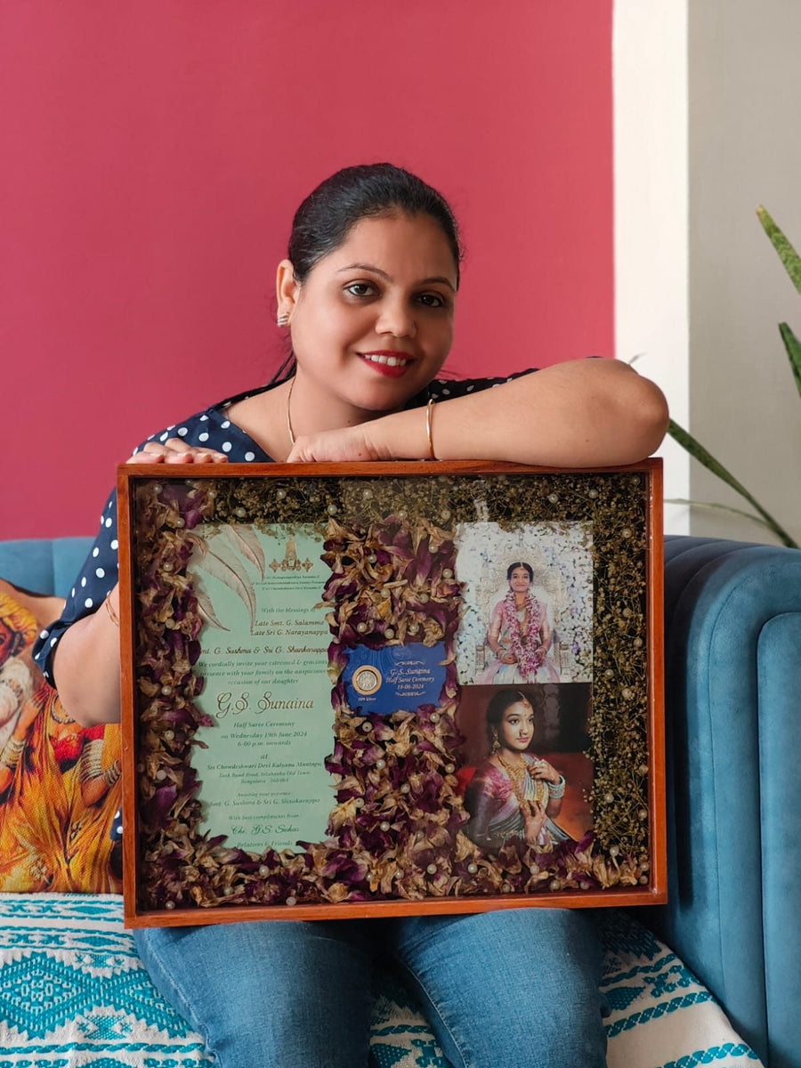 Varmala frame holding the wedding card and two photos, made in our Jaipur studio