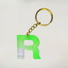 Purchase Stylish Transparent Green Resin Keychains with Stunning R initials For Brother