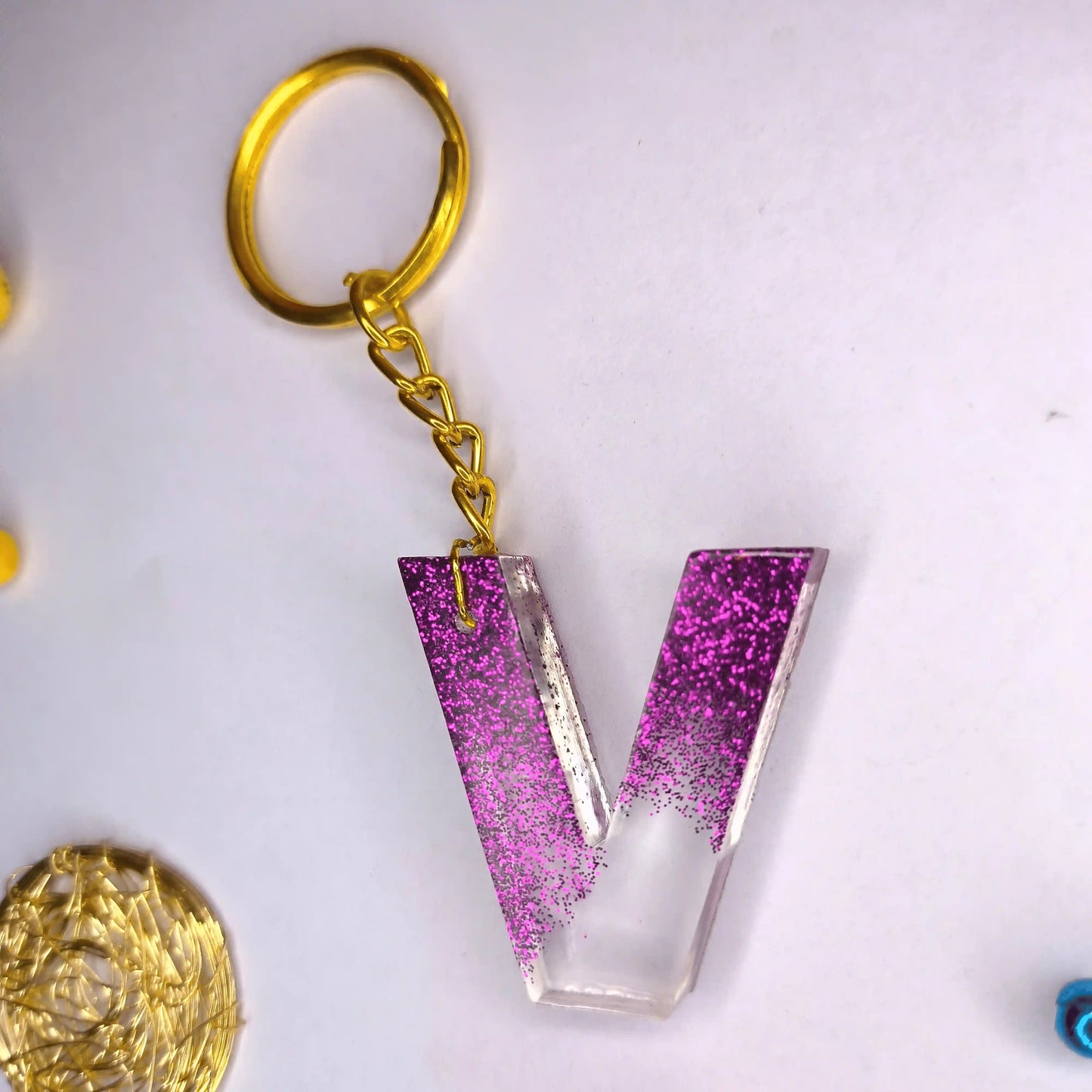 Shop Modern Resin keychains With V initials For Teachers day