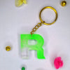 Shop Stylish Transparent Green Resin Keychains with Stunning R initials For Brother