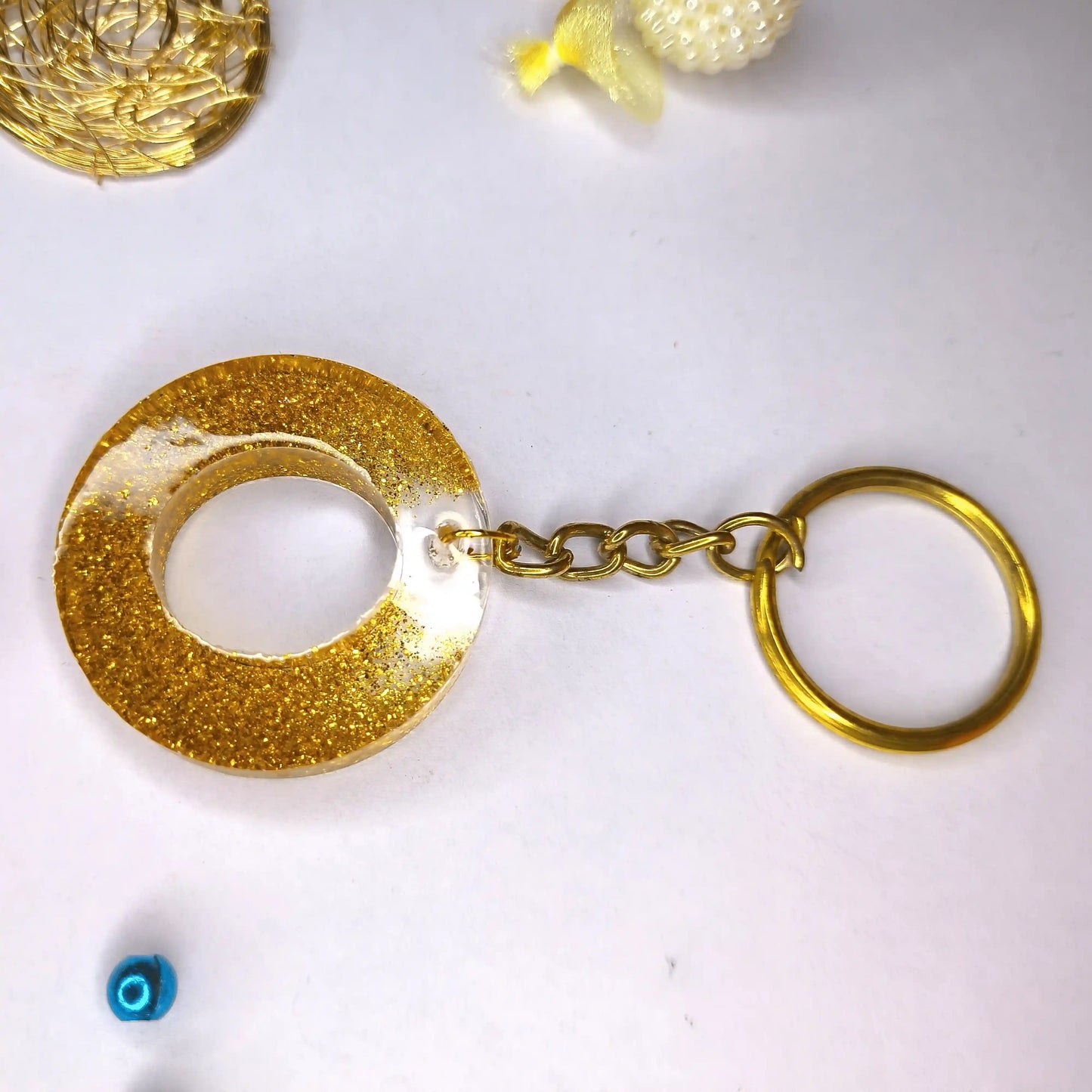 Trendy Golden sparkle Resin keychains with multi Alphabet Perfect Gift for Women for Sale